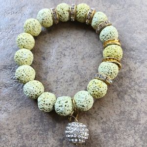 Yellow Lava rock beaded bracelet with rhinestone charms